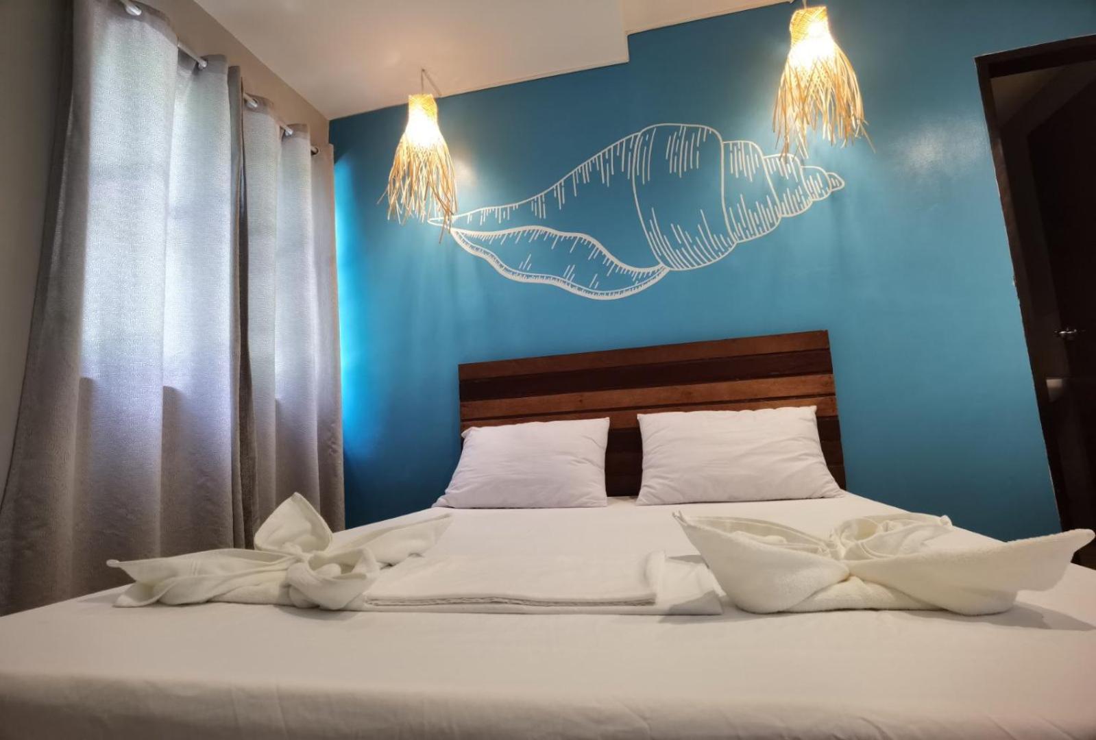 Amos Pili Tree Inn Powered By Cocotel El Nido Bilik gambar